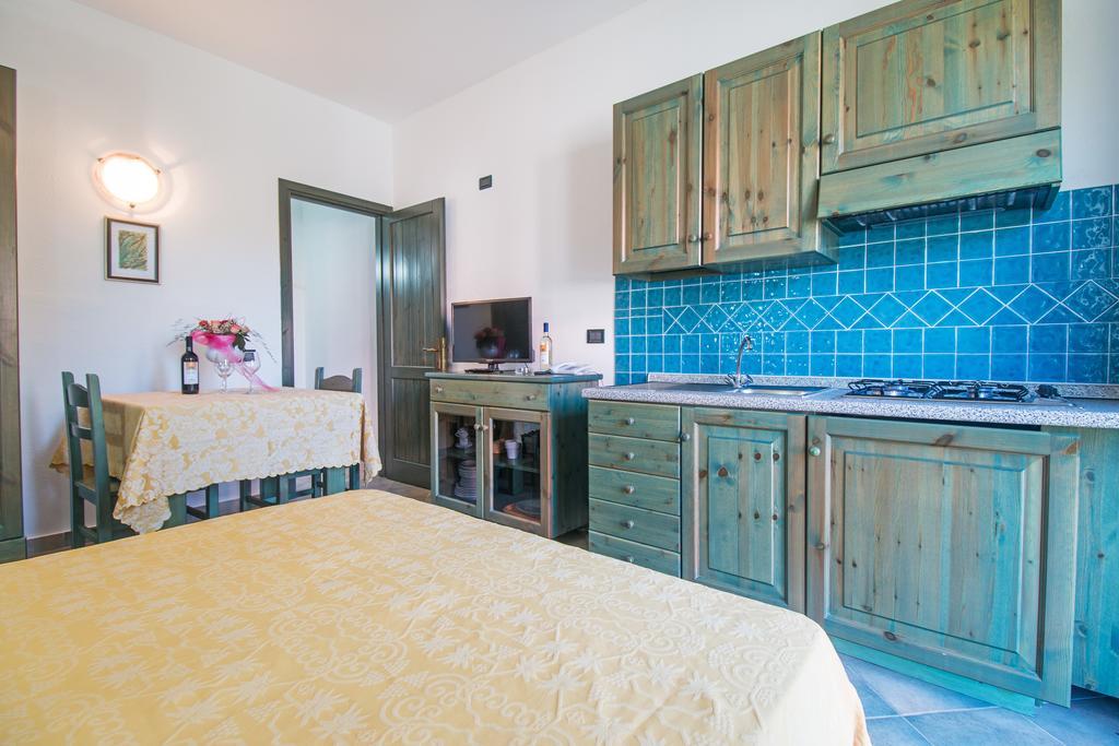 Albergo Residenziale Gli Ontani Cala Liberotto Esterno foto