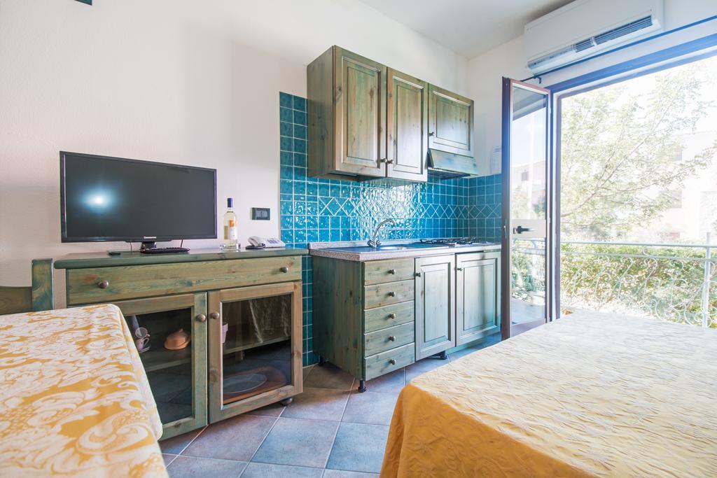 Albergo Residenziale Gli Ontani Cala Liberotto Esterno foto