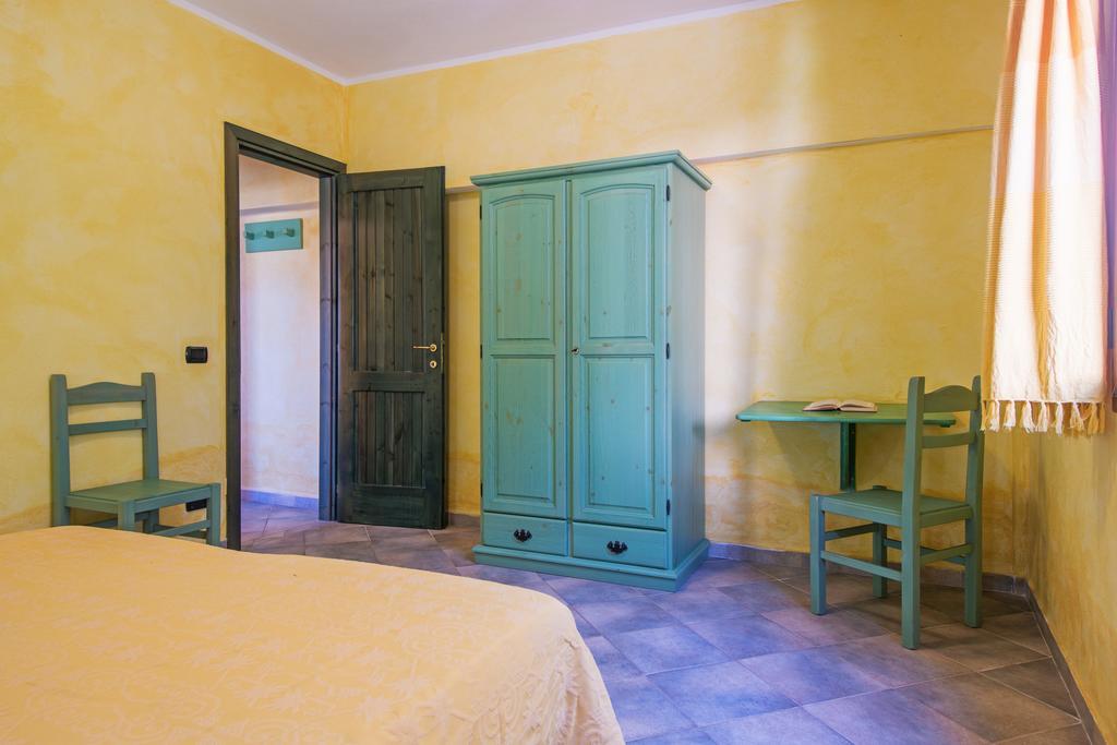 Albergo Residenziale Gli Ontani Cala Liberotto Esterno foto