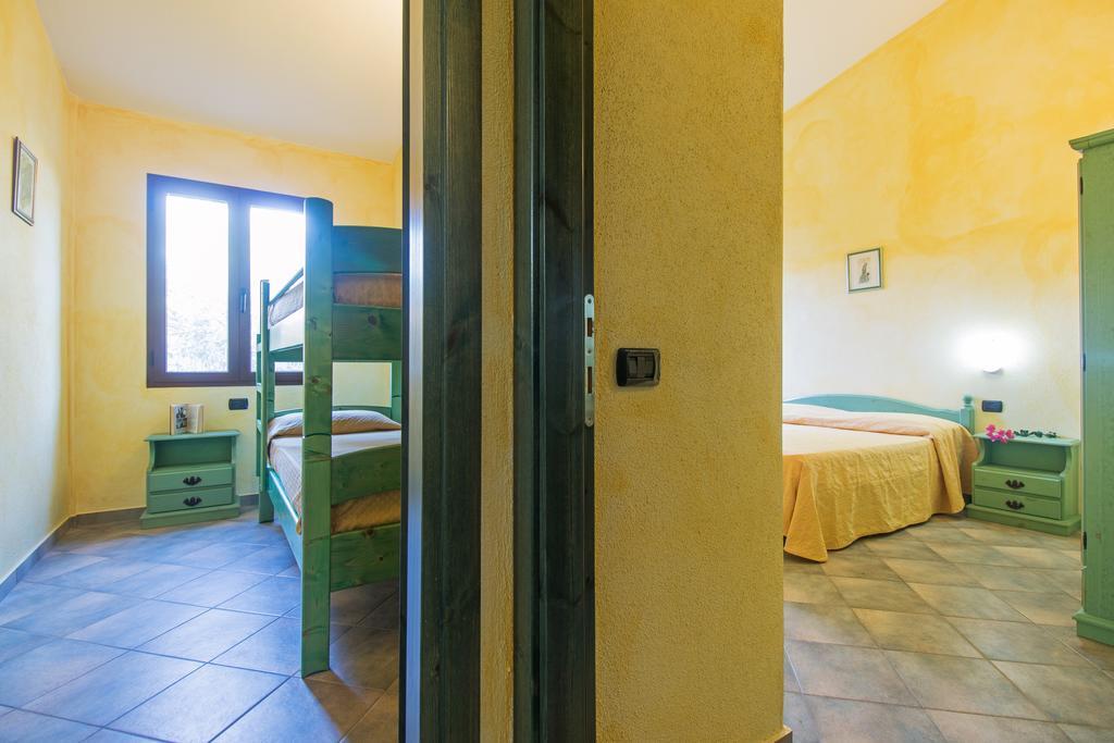 Albergo Residenziale Gli Ontani Cala Liberotto Esterno foto
