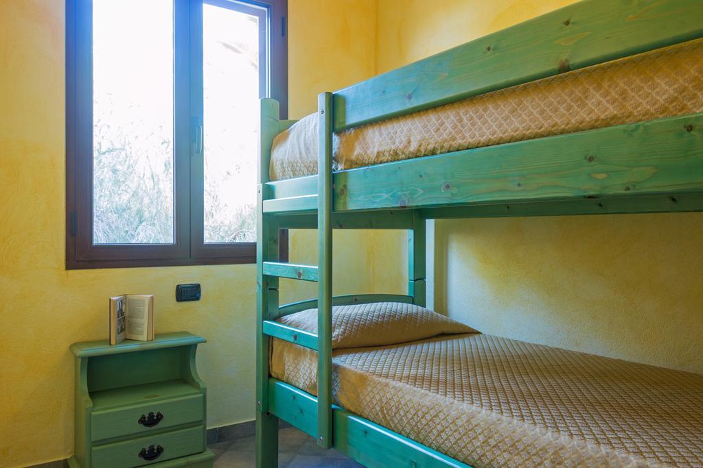 Albergo Residenziale Gli Ontani Cala Liberotto Esterno foto