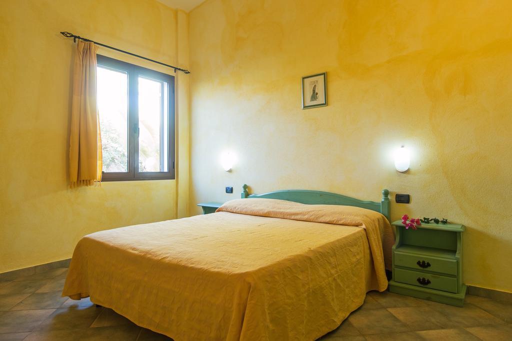 Albergo Residenziale Gli Ontani Cala Liberotto Esterno foto