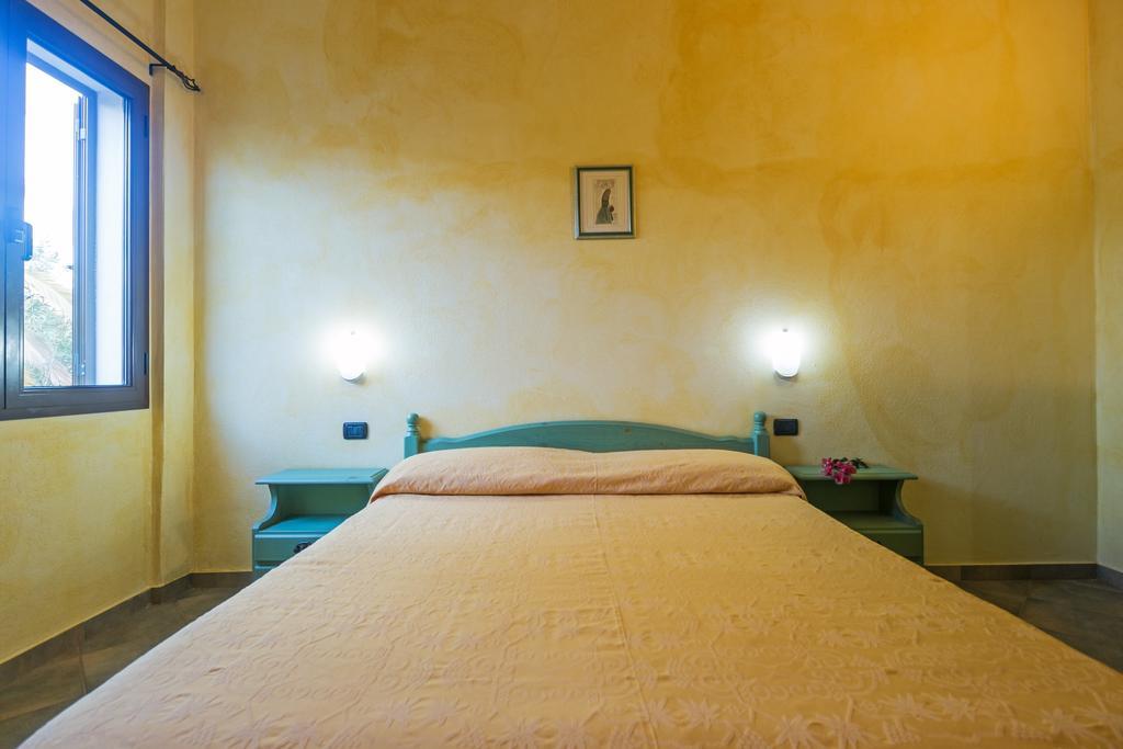 Albergo Residenziale Gli Ontani Cala Liberotto Esterno foto