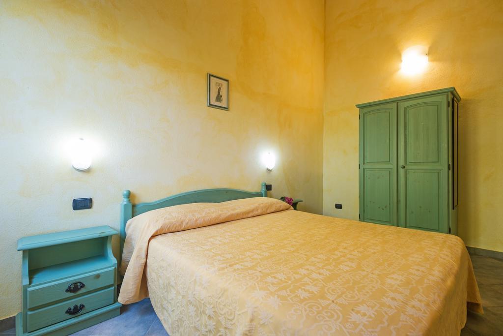Albergo Residenziale Gli Ontani Cala Liberotto Esterno foto
