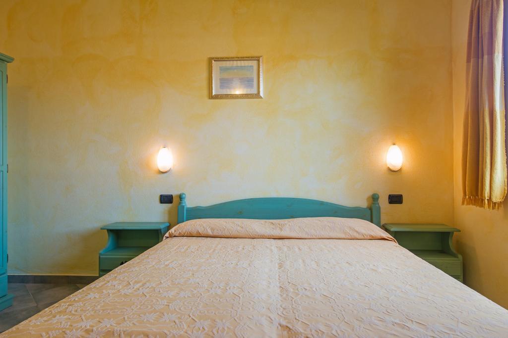Albergo Residenziale Gli Ontani Cala Liberotto Esterno foto