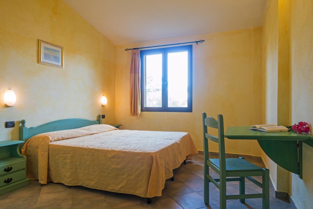 Albergo Residenziale Gli Ontani Cala Liberotto Esterno foto