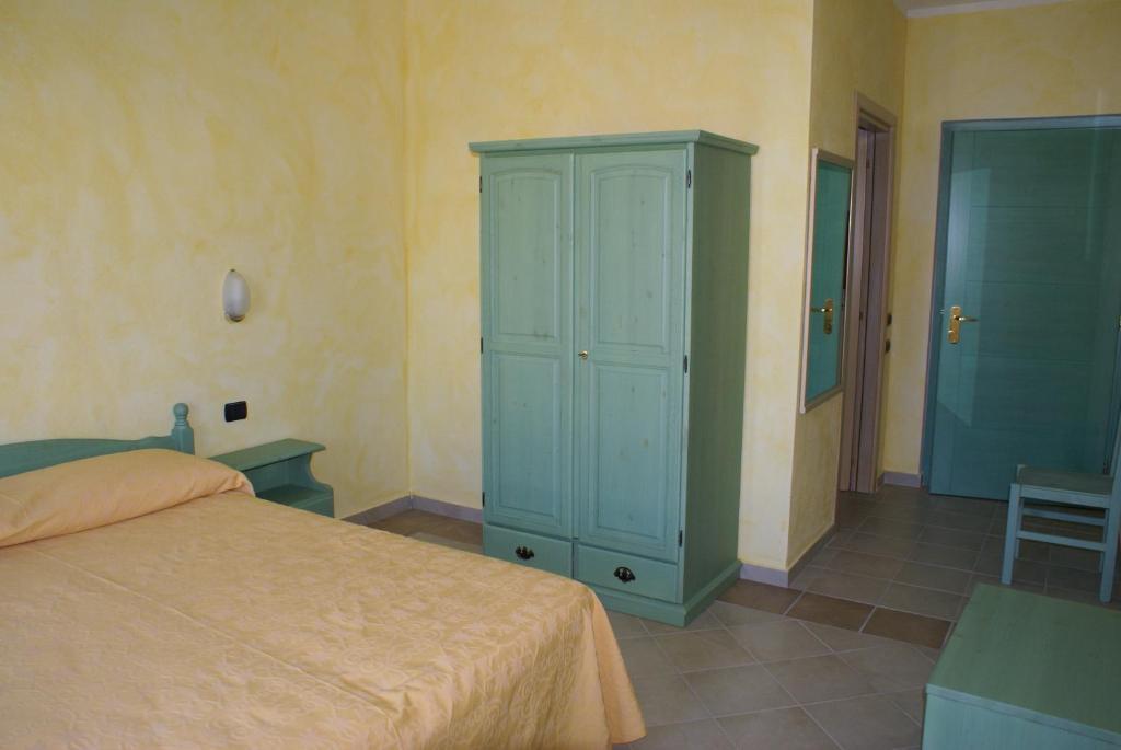 Albergo Residenziale Gli Ontani Cala Liberotto Camera foto